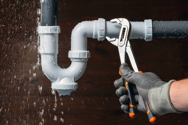 Professional Emergency Plumber technician working in Elrama, PA
